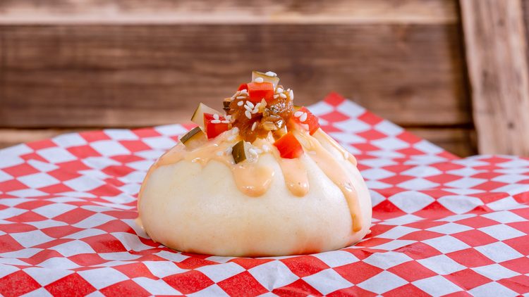 Cheeseburger bao (California Craft Brews at Disney California Adventure Park in Anaheim, Calif.) with thousand island dressing, grilled onions, pick and tomato relish